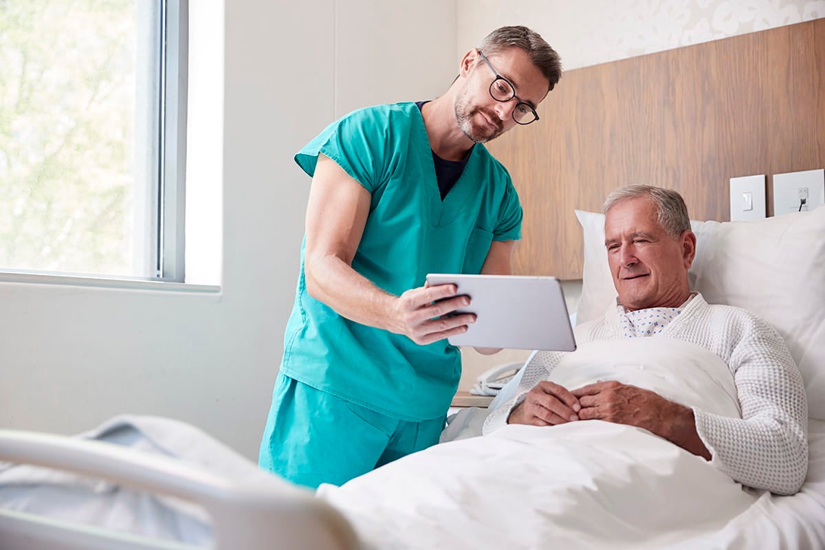 Man in hospital bed at Ascension site of care after getting emergency stroke care.
