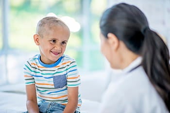 Child talking with a doctor.