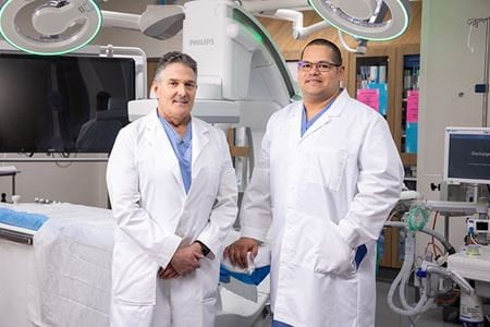 Ascension Providence cardiovascular clinic doctors standing in OR.
