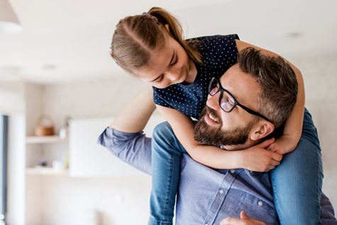 A dad with is daughter.